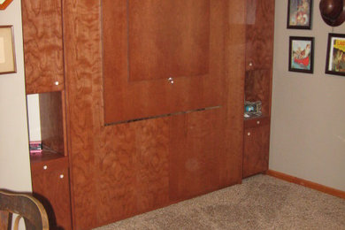 Example of a small classic guest carpeted bedroom design in Seattle with beige walls