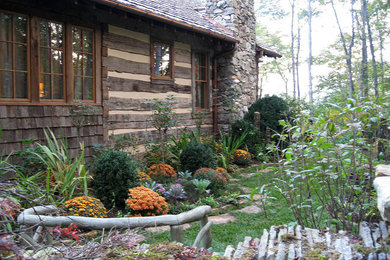 Photo of a mid-sized traditional shade backyard landscaping in Atlanta for summer.