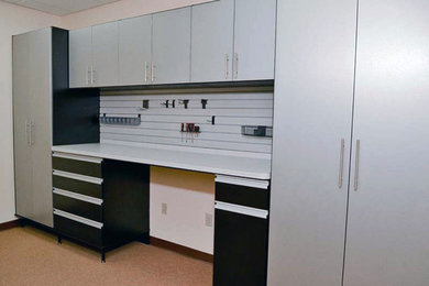 Example of an arts and crafts garage design in Other
