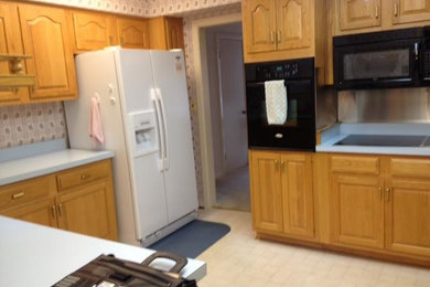 Example of a classic kitchen design in Other