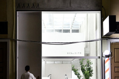 Example of an urban home design design in Other