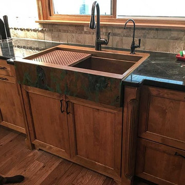 Retrofit farmhouse copper workstation sink saves the day!