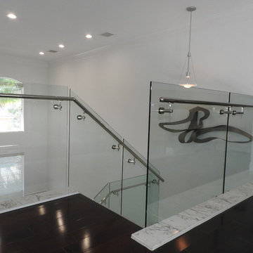 Glass staircase railing