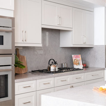 Complementing Tope and Gray Cabinetry and Countertops