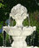 Sunnydaze 4-Tier White Electric Outdoor Water Fountain with Fruit Top - 52-Inch