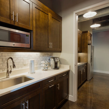 Compact Modern Office Kitchen With Sleek Wood Cabinetry