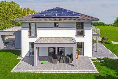 This is an example of a large contemporary home design in Munich.