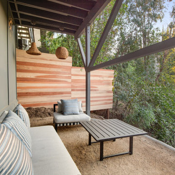 After - Ground-Level Lounge Reclaimed Under the Decks