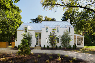 Example of a large trendy exterior home design in Grand Rapids