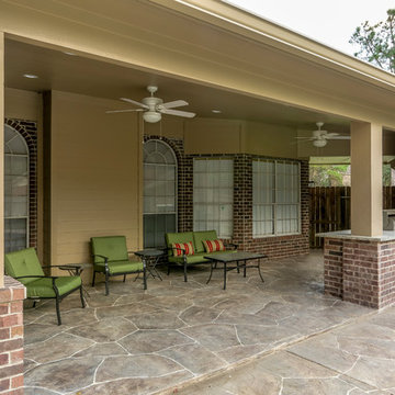 Stone Patio with Outdoor Kitchen and Pool