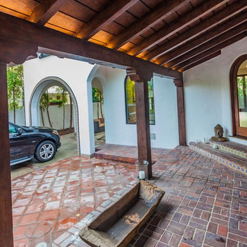 Tiled Entry Porch With Beamed Ceiling