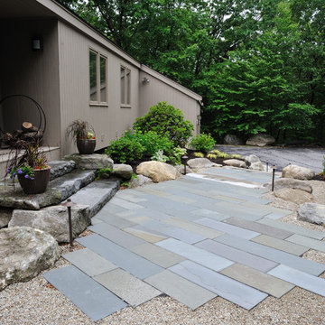 Front entrance renovation with reclaimed granite steps and bluestone landings.
