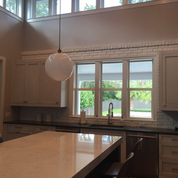 Pendulum Lights with Brick Backsplash