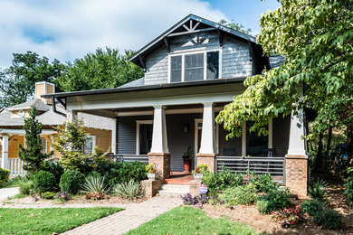 Large arts and crafts gray two-story concrete fiberboard gable roof photo in Atlanta
