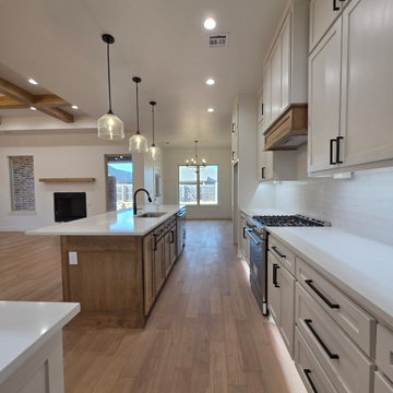 The bright kitchen is beautifully appointed