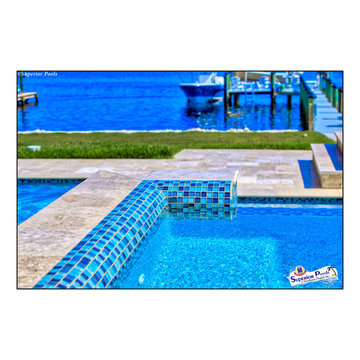 Bennett Nokomis, FL Custom Court Yard Swimming Pool & Spa With Raise Beach Area.