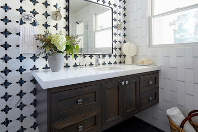 Inspiration for a mid-sized transitional master black and white tile and ceramic tile single-sink bathroom remodel in San Francisco with shaker cabinets, brown cabinets, an undermount sink, quartz countertops, white countertops and a floating vanity