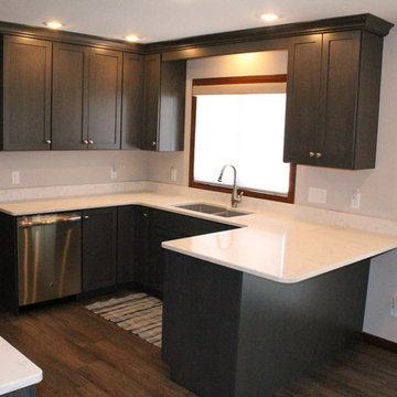 Dynasty By Omega Cabinetry. Puritan door, Cherry wood, Smokey Hills stain.