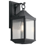 Kichler - Outdoor Wall 1-Light, Distressed Black - The 17.75" 1 light outdoor wall sconce from the Springfield collection offers classic style with a weathered effect. The hammered-look metal and Distressed Black finish give each fixture texture and character, while the seeded glass softly diffuses the light.