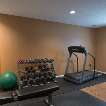 Finished basement with exercise area and small bath in Wexford, PA
