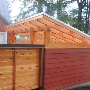 Side of shed and fence adjacent to neighbors