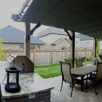 Retractable Shade Screens with Outdoor Kitchen & Patio