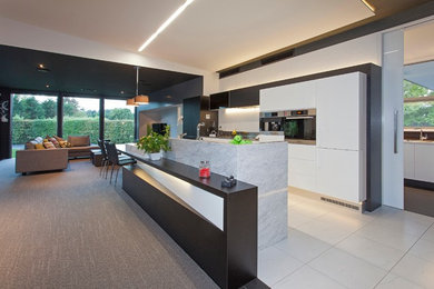 Example of a minimalist galley open concept kitchen design in Christchurch