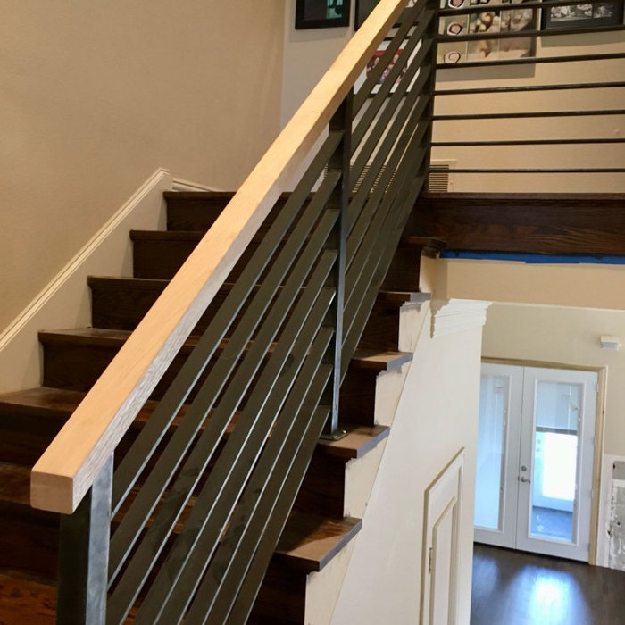 Updating a stairway in Addison with oak and metal.