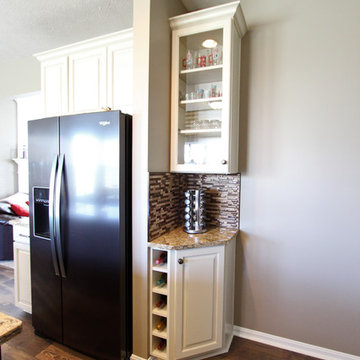 Cream Kitchen with Contrasting Dark Island with Quartz Countertop