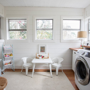 Wash, Rinse and Play in This Multipurpose Laundry Room