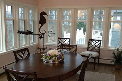Kitchen/dining room combo - mid-sized traditional dark wood floor and brown floor kitchen/dining room combo idea in Portland Maine with beige walls