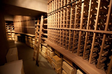 Inspiration for a large modern wine cellar in San Francisco with storage racks.