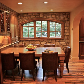 Mediterranean Luxury Kitchen Remodel | Stone Accents & Arched Detailing