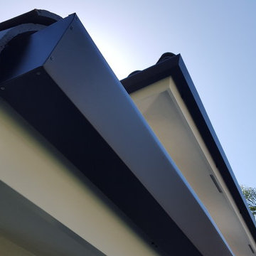 Huntington Beach California, White Fascia Wrap, Black 6 inch Angle Face Gutters