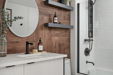 Bathroom - small modern brown tile porcelain tile, gray floor, single-sink and wood wall bathroom idea in Toronto with flat-panel cabinets, light wood cabinets, a one-piece toilet, white walls, an undermount sink, quartzite countertops, beige countertops and a freestanding vanity
