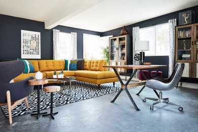 Example of a large trendy freestanding desk concrete floor and gray floor home office design in New York with gray walls