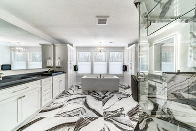Bathroom - huge contemporary master black and white tile and porcelain tile porcelain tile and white floor bathroom idea in Cleveland with a bidet, white walls, a hinged shower door and black countertops
