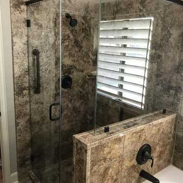 Madiera Granite shower w/ 12x12 Slate Embossed walls