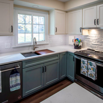 Custom Two-Toned Green and White Kitchen with Laventa Carrara Quartz Countertops
