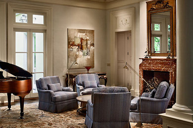 Inspiration for a timeless dark wood floor living room remodel in Atlanta with a music area, beige walls, a standard fireplace and a stone fireplace