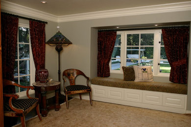 Inspiration for a mid-sized timeless formal and enclosed carpeted and brown floor living room remodel in San Francisco with beige walls, no fireplace and no tv
