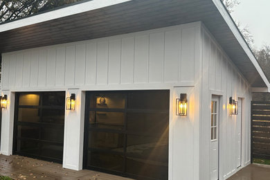 Inspiration for a large modern backyard concrete paver patio remodel in Indianapolis with a gazebo