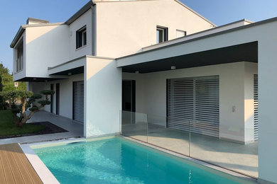 Immagine di grandi case e interni minimalisti