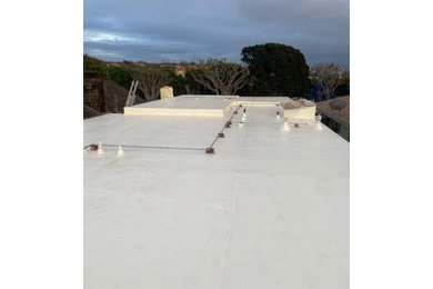 Flat roof photo in Orange County with a green roof and a white roof