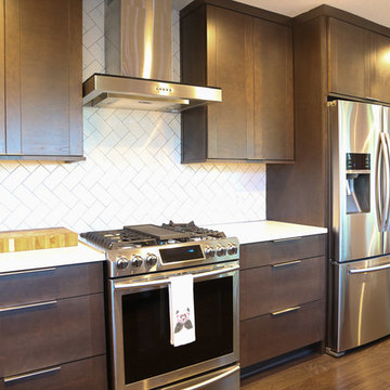 Contemporary Espresso Kitchen with White Countertops