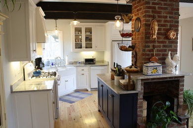 Example of a farmhouse kitchen design in Portland Maine