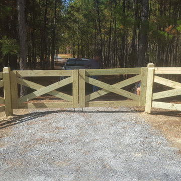 wood rail fence with cross pattern
