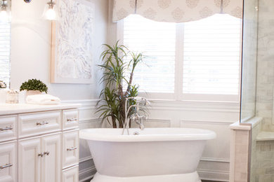 Example of a large classic master gray tile, white tile and stone tile porcelain tile bathroom design in Indianapolis with recessed-panel cabinets, white cabinets, white walls, an undermount sink and marble countertops