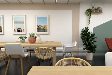 Cette image montre une petite salle à manger ouverte sur le salon minimaliste avec un mur vert, un sol en vinyl et éclairage.