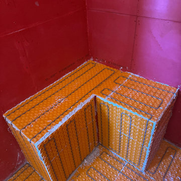 Curd-less walk-in shower; heated floors in bathroom + shower+bench LED